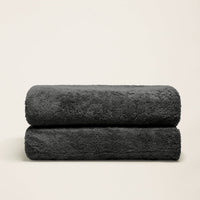 Set of two Italic Ultraplush Australian Cotton Bath Towels with soft, absorbent texture for home use.