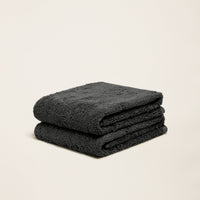 Set of two Italic Ultraplush Australian Cotton Bath Towels showing soft, plush texture in natural white for luxurious home use.