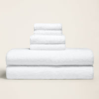Set of two Ultraplush Australian cotton bath towels by Italic, soft and plush for home use in a modern bathroom setting.