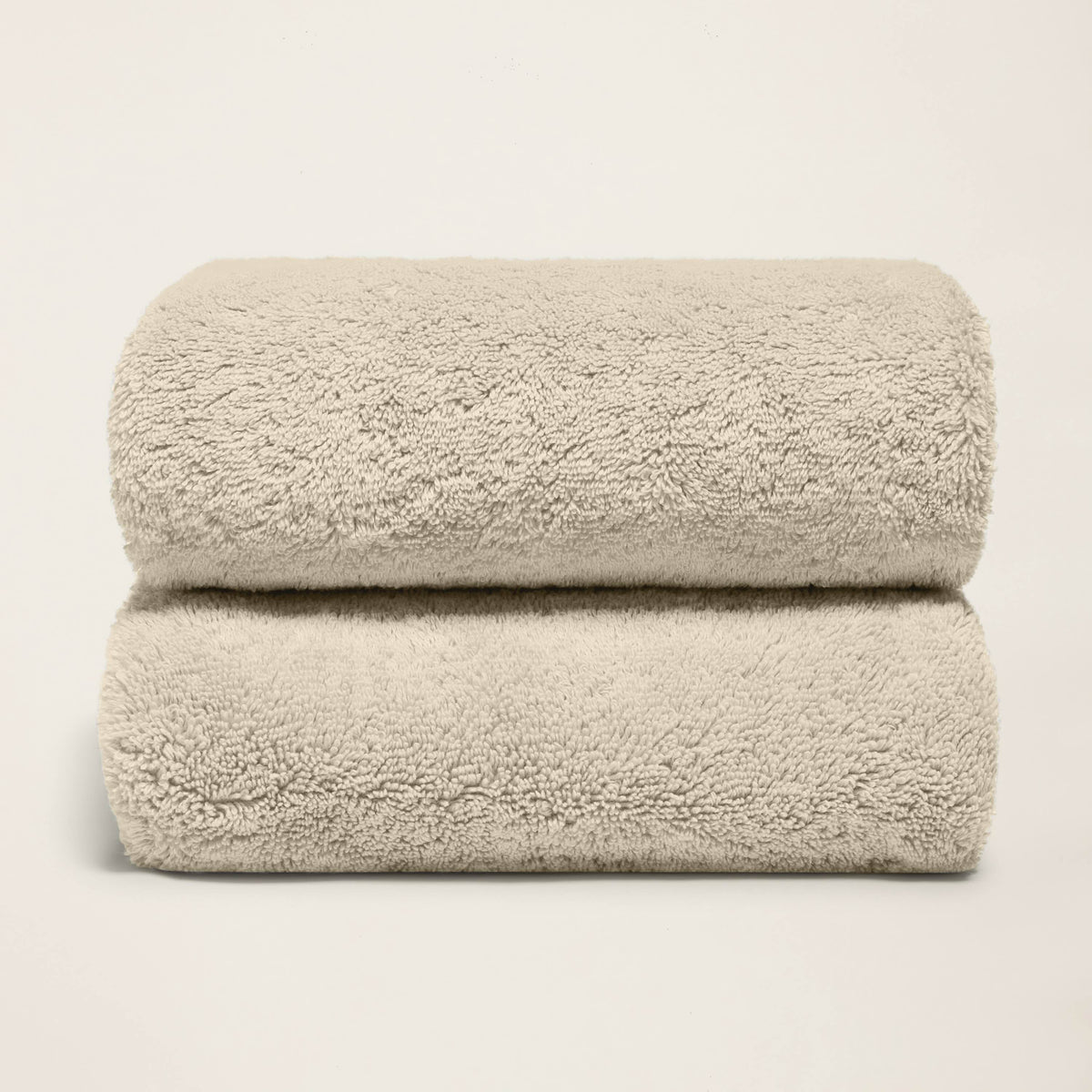 Set of two Italic Ultraplush Australian Cotton Bath Towels with soft, plush texture and natural white color.