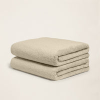 Set of two Italic Ultraplush Australian Cotton Bath Towels featuring soft, plush white fabric for luxurious home bath use.