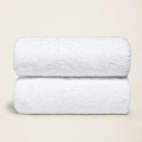 Set of two Italic Ultraplush Australian Cotton Bath Towels, soft and plush for home use, shown in a natural color.