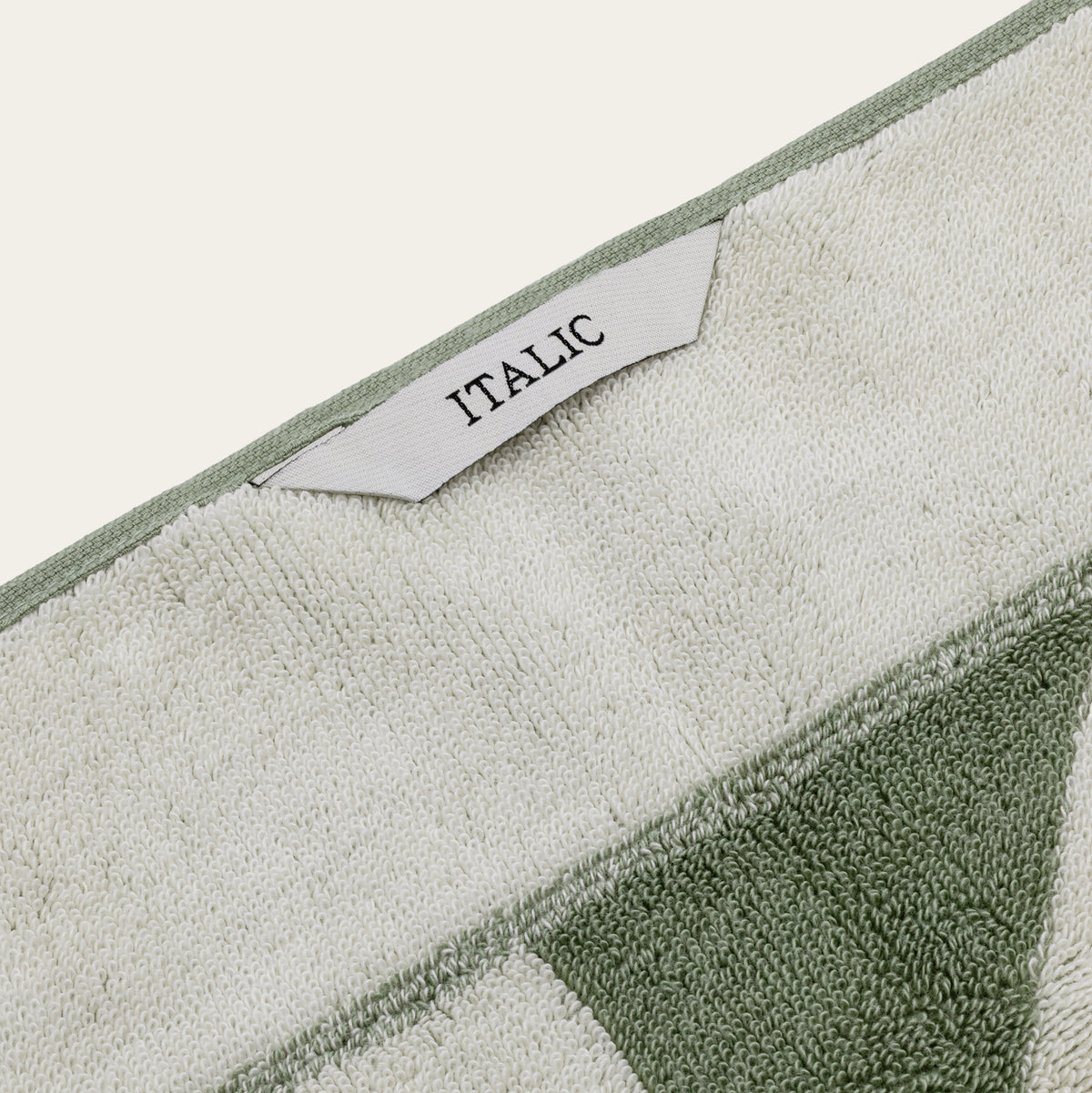 Set of two Italic Umbra bath towels in sage and ecru, soft and plush home bath towels for everyday use.