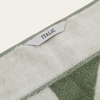 Set of two Italic Umbra bath towels in sage and ecru, soft and plush home bath towels for everyday use.