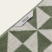 Set of two Italic Umbra bath towels in sage and ecru, soft and absorbent for home bathroom use.