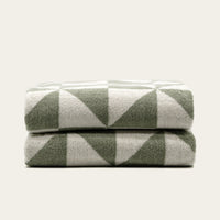 Set of two Italic Umbra bath washcloths in sage and ecru, soft cotton towels for home bath and skincare.