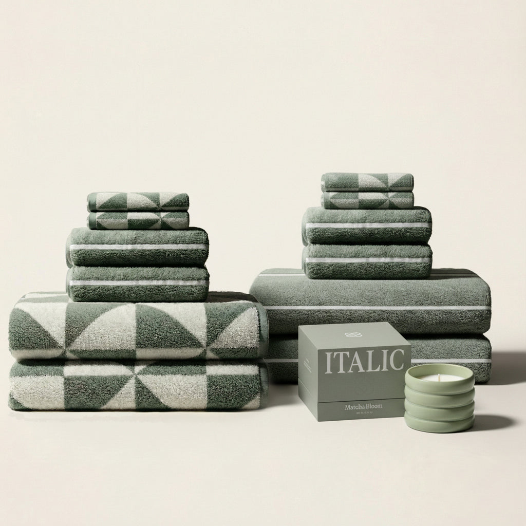 Set of two Italic Umbra bath towels in sage and ecru, soft cotton home washcloths for everyday use.