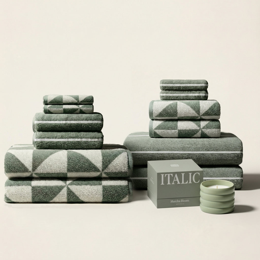 Set of two Italic Umbra bath washcloths in sage and ecru, soft cotton towels for home bathroom use.