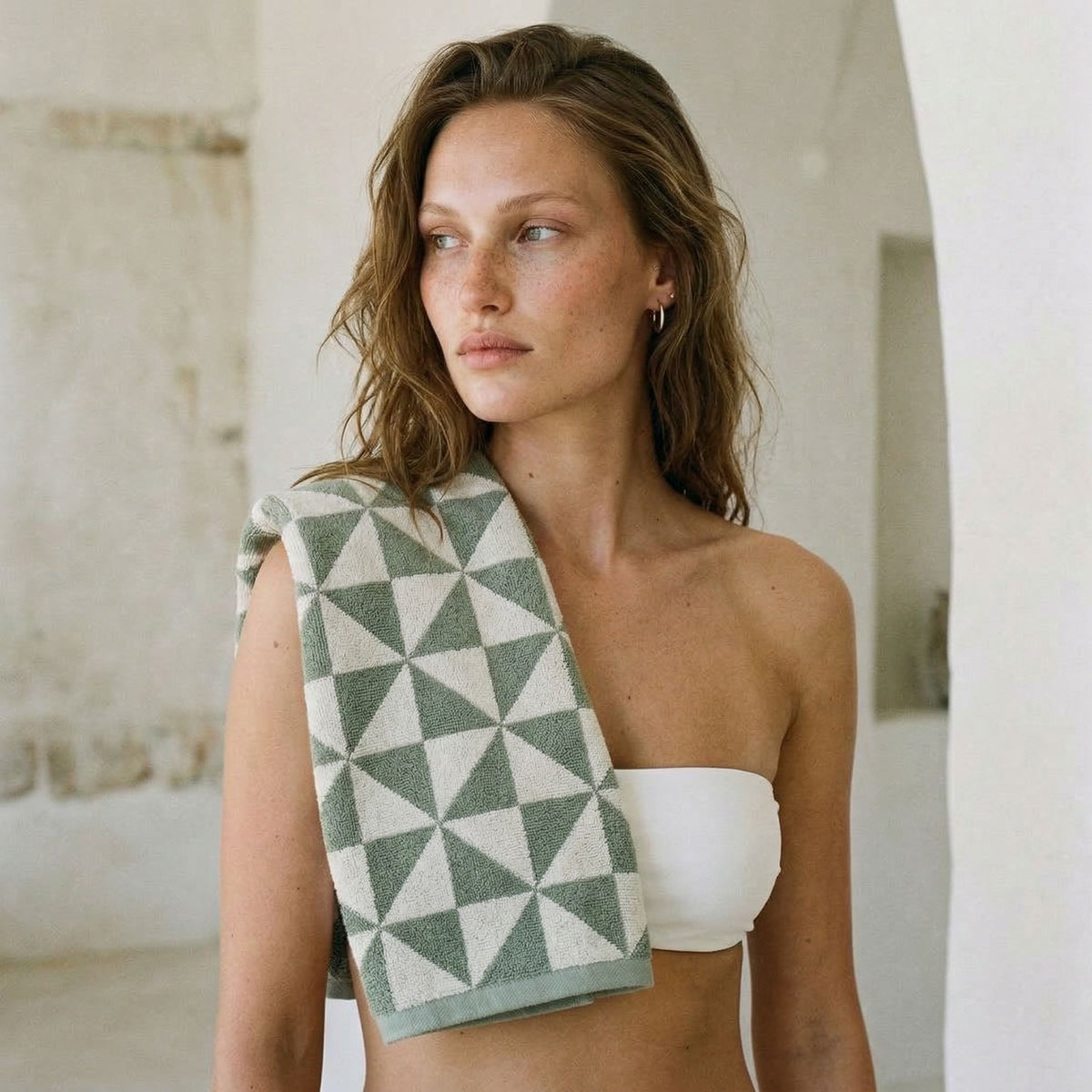 Set of two Italic Umbra bath washcloths in sage and ecru, soft and plush home bath towels displayed on a neutral background.