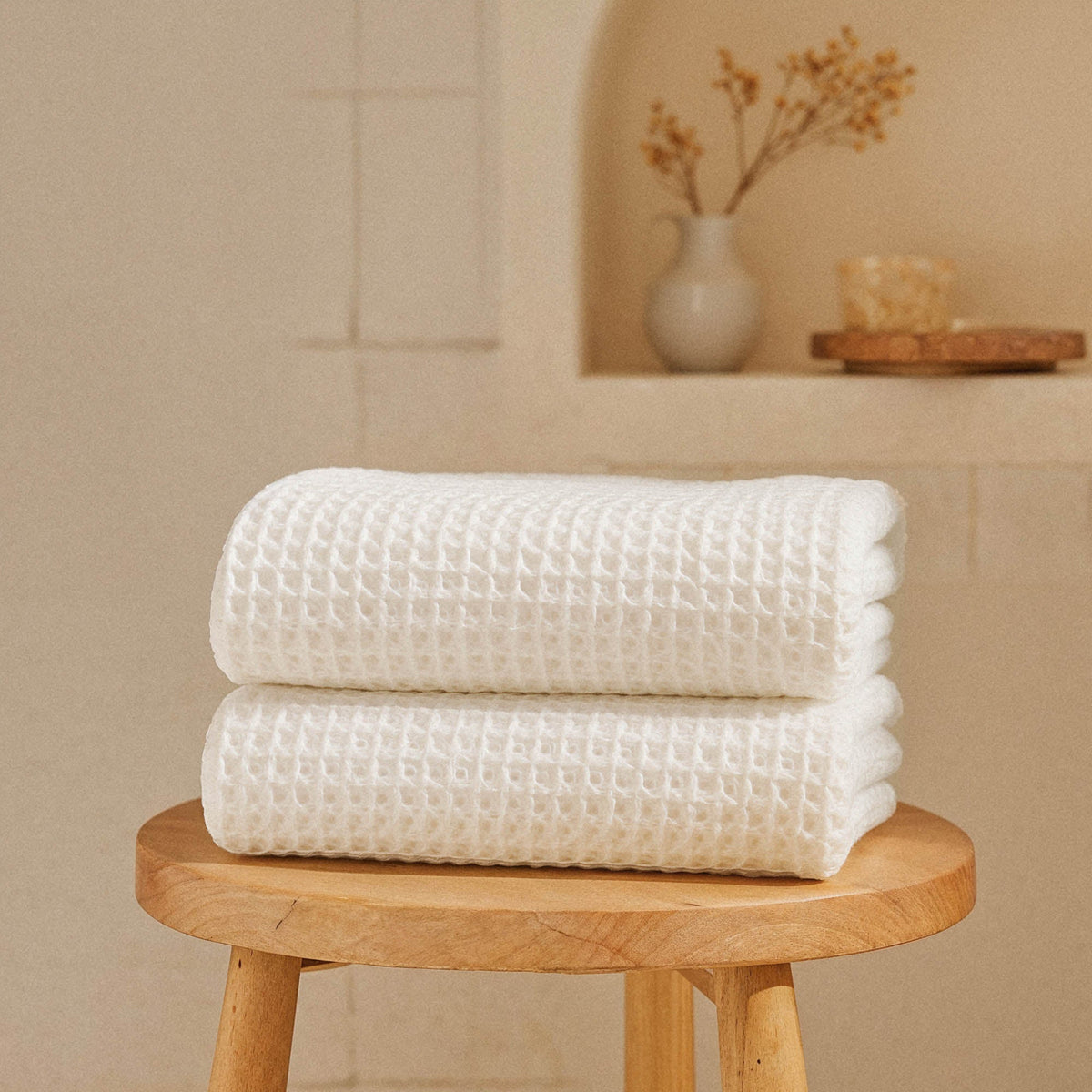 Set of two white Sedona waffle bath towels by Italic, showing soft, textured fabric perfect for home use.