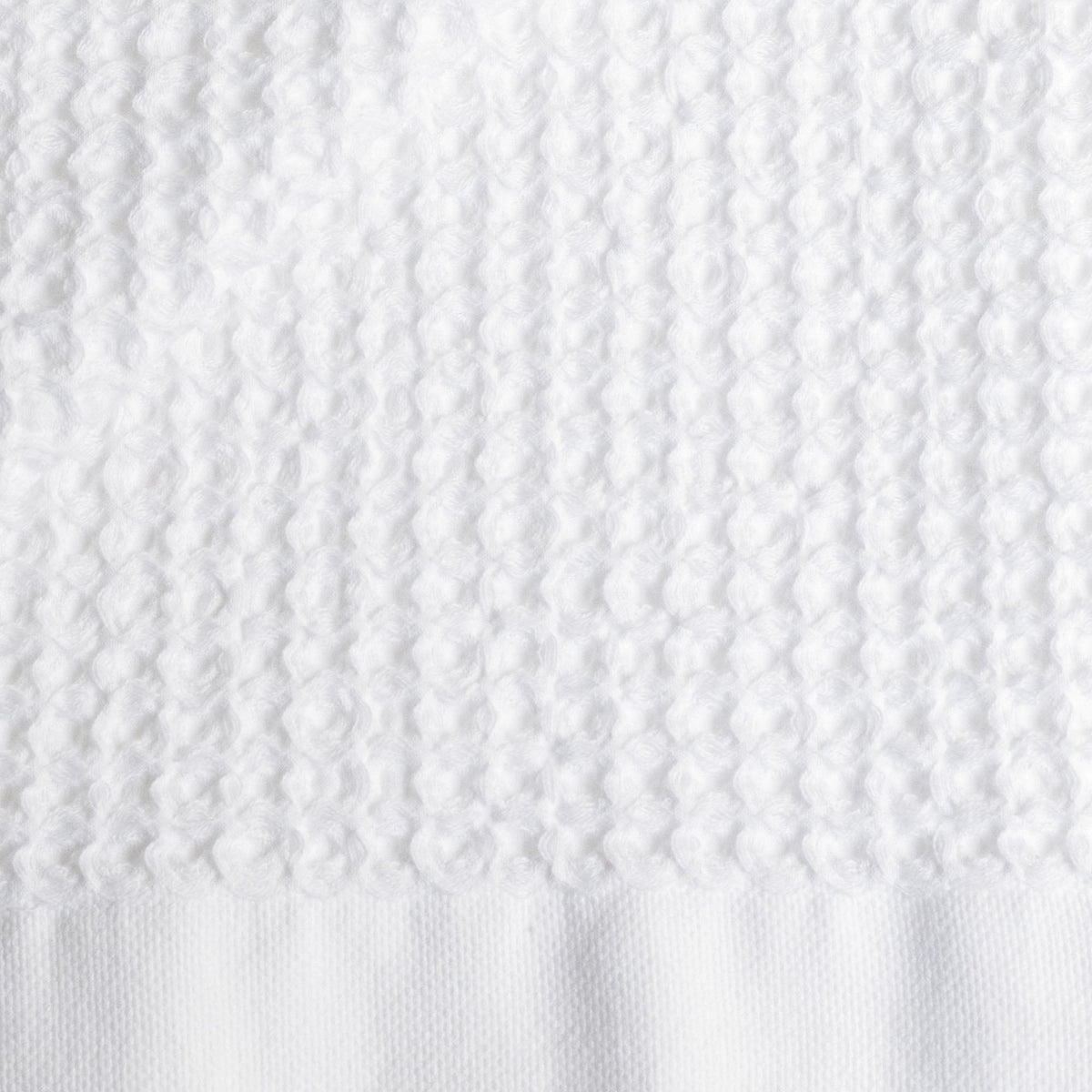 Set of two white Sedona waffle bath towels by Italic, showcasing soft, textured fabric perfect for home bathroom use.