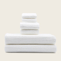 Set of two white Sedona waffle bath towels from Italic, soft and absorbent home bath accessories shown in the image.