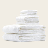 Set of two white Sedona waffle bath towels by Italic, showing soft, textured fabric perfect for home use.