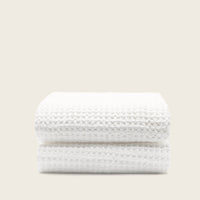 Set of two white Sedona waffle bath towels by Italic, soft and absorbent for home bathroom use