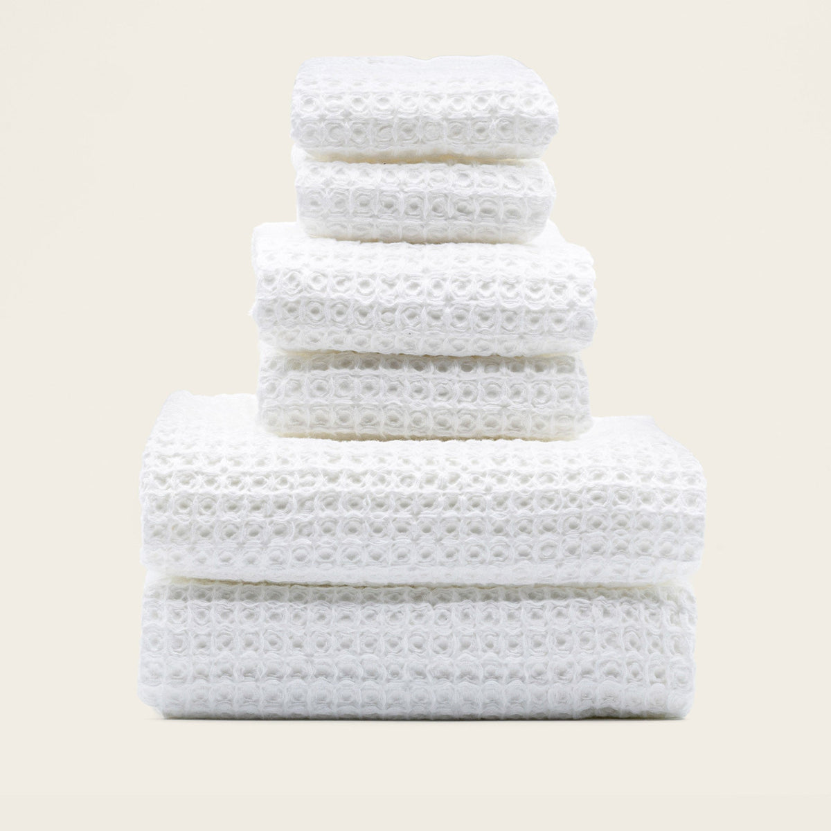 Set of two white Sedona waffle towels by Italic for home bath use, featuring textured, absorbent fabric in the image.