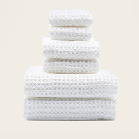 Set of two white Sedona waffle towels by Italic for home bath use, featuring textured, absorbent fabric in the image.