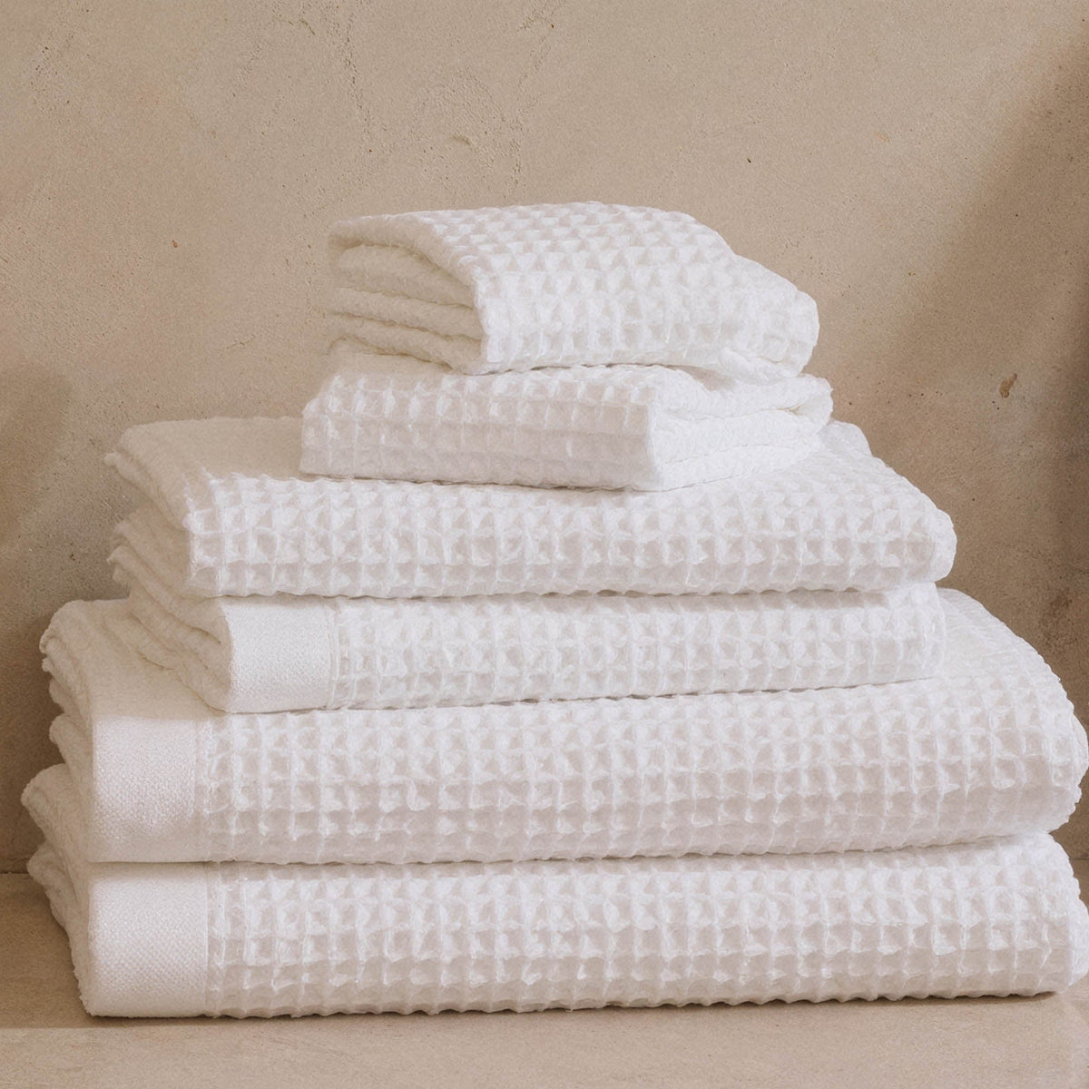 Set of two white Sedona waffle bath towels by Italic, showing soft, textured waffle fabric for home bath use