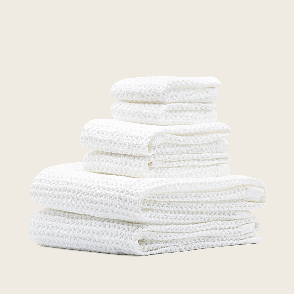 Set of two white Sedona waffle bath towels by Italic, showing soft, textured fabric perfect for home bathroom use.