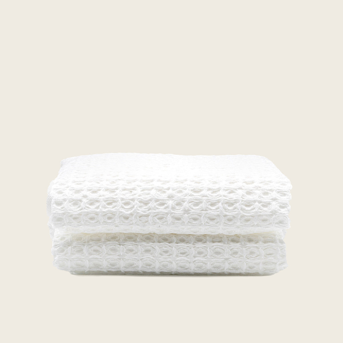Set of two white Sedona waffle towels from Italic, soft and textured bath washcloths for home use.
