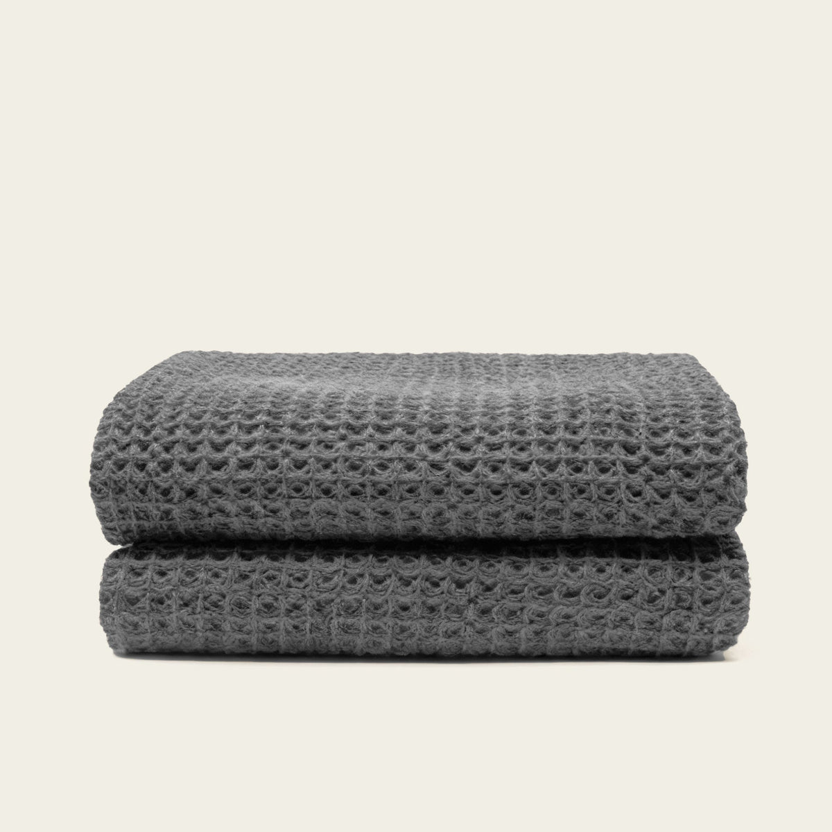 Set of two white Sedona waffle bath towels by Italic, soft and textured home bath towels with a waffle weave pattern.