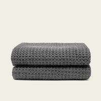 Set of two white Sedona waffle bath towels by Italic, soft and textured home bath towels with a waffle weave pattern.