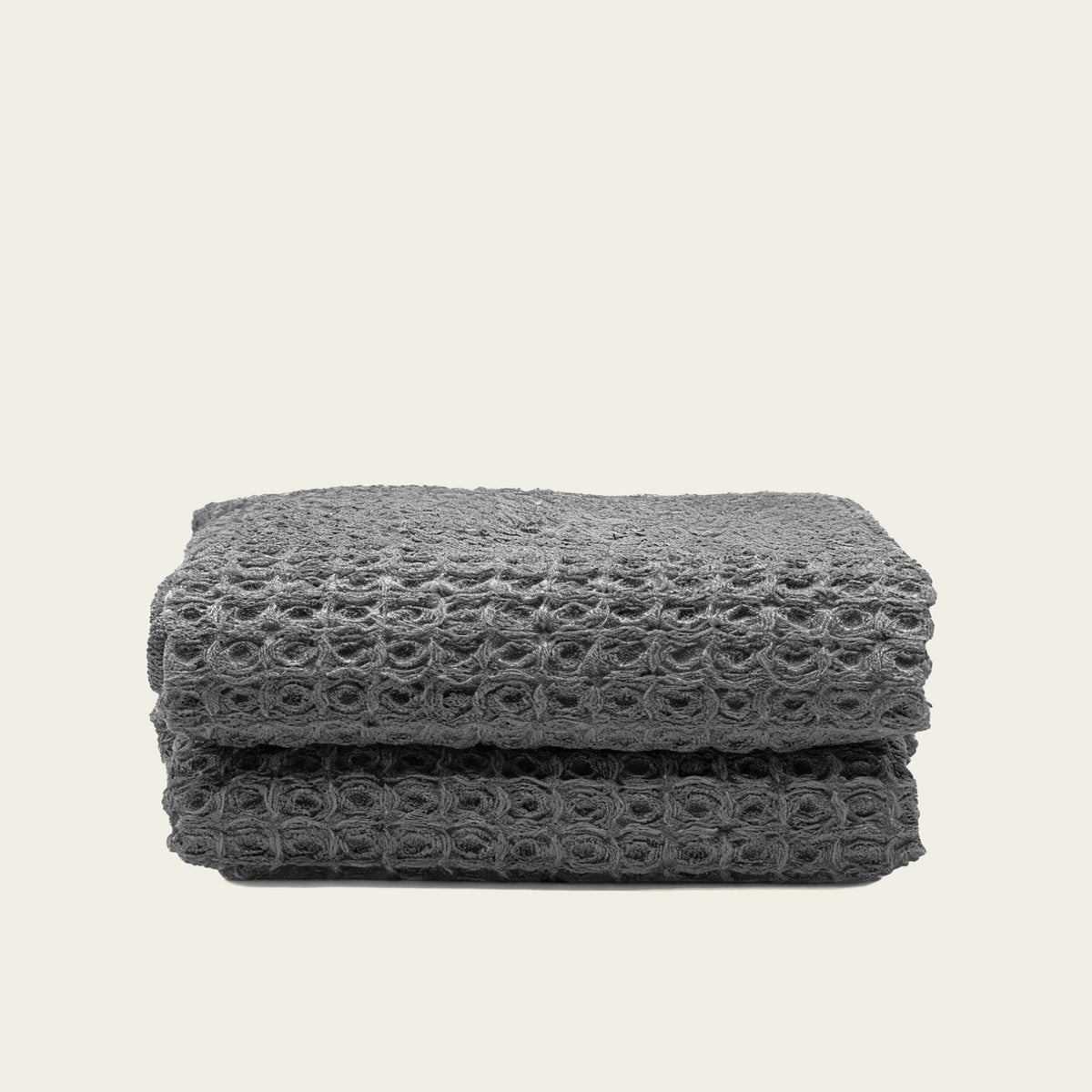 Set of two white Sedona waffle bath towels by Italic, soft and textured for luxurious home bath use.