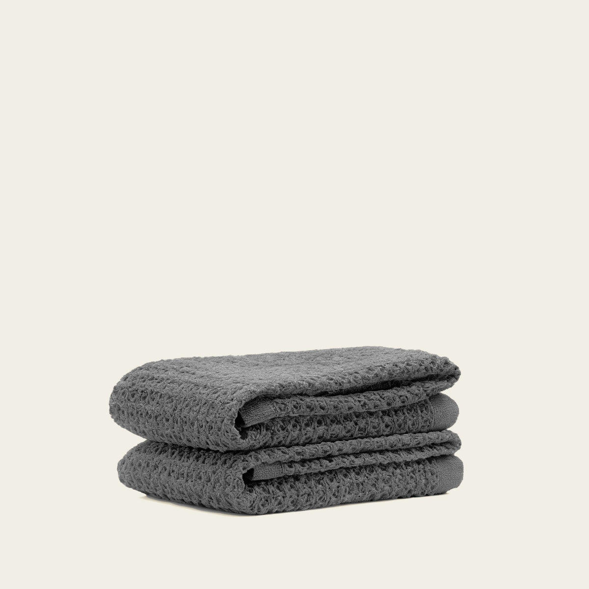 Set of two white Sedona waffle bath towels by Italic, soft and textured for comfortable home use.
