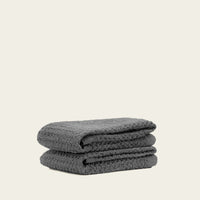 Set of two white Sedona waffle bath towels by Italic, soft and textured for comfortable home use.