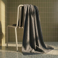 Set of two white Sedona waffle towels from Italic, soft home bath washcloths with textured waffle weave fabric.