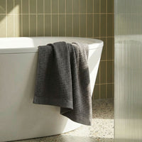 Set of two white Sedona waffle bath towels from Italic, soft and plush for home use.