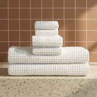 Set of two white Sedona Waffle Towels by Italic, plush bath washcloths with a textured waffle weave for soft, absorbent home bath use.