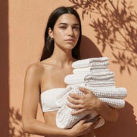 Set of two white Sedona Waffle Towels from Italic, soft bath washcloths with textured waffle weave for gentle drying.