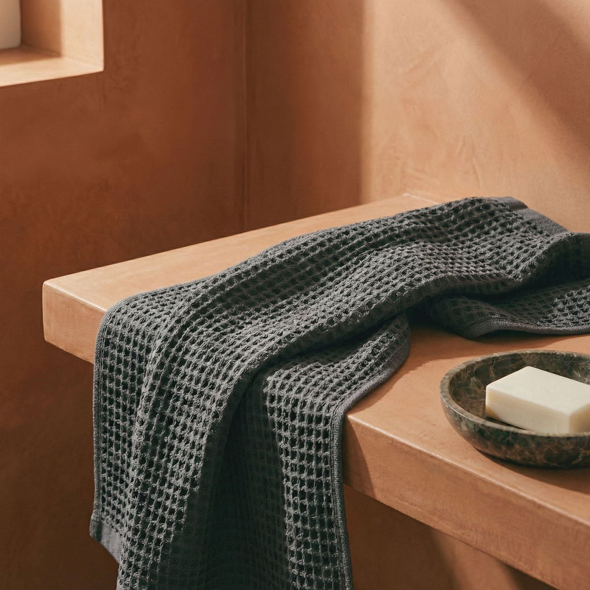 Set of two white Sedona waffle bath towels by Italic, soft and textured for home bathroom use.