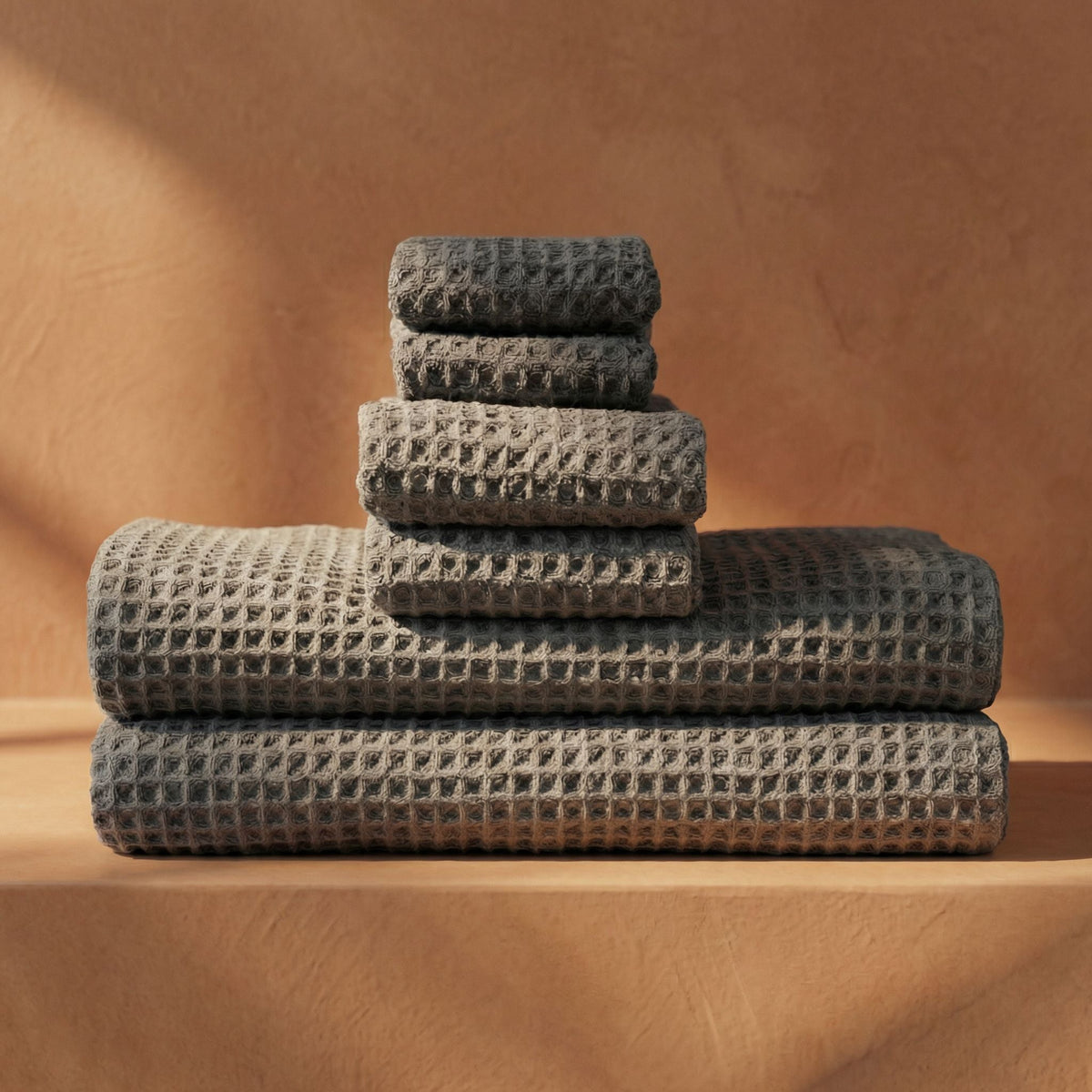 Set of two white Sedona waffle bath towels by Italic, soft, textured fabric for home bathroom use.