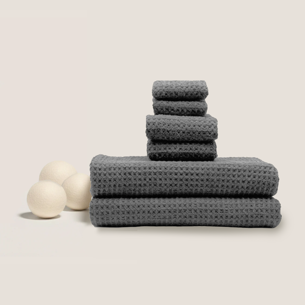 Set of two white Sedona waffle bath towels by Italic, soft and absorbent for home bathroom use.