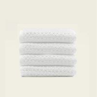 Set of two white Sedona waffle bath towels by Italic, showing soft, textured fabric perfect for home bathing comfort.