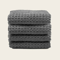 Set of two white Sedona waffle bath towels by Italic, soft and textured for luxurious home bathroom use.