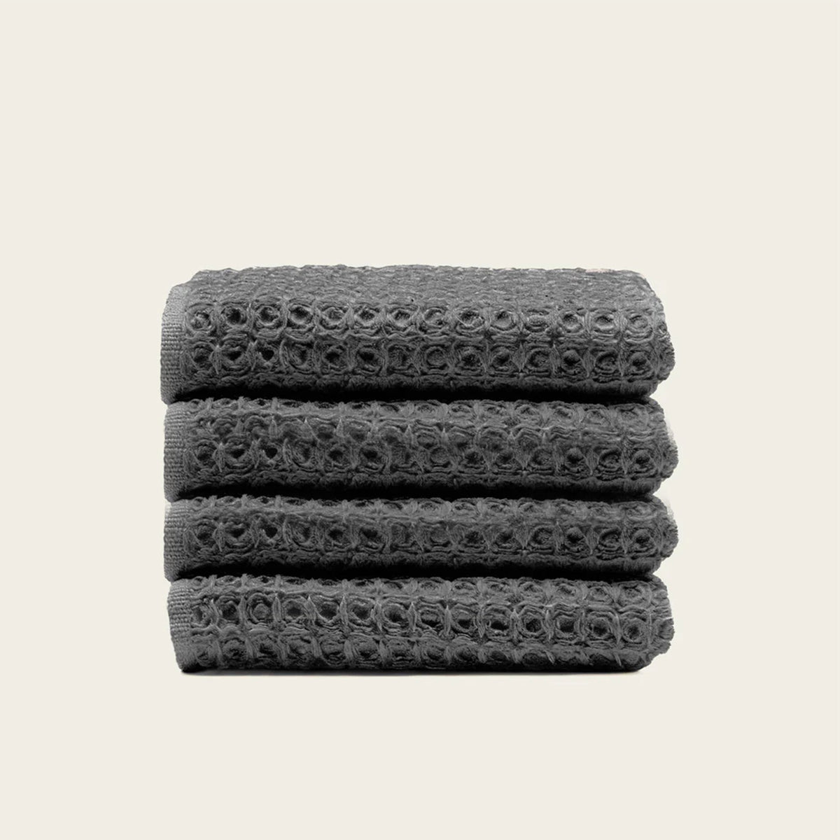 Set of two white Sedona waffle bath towels by Italic, soft and textured for home use.