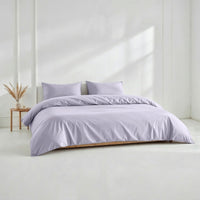 Blue and white Luxe Australian Sateen Bedding Bundle by Italic on a bed, showcasing smooth, luxurious sateen fabric and elegant design.