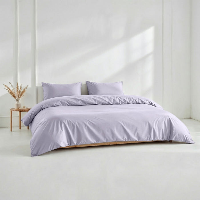 Blue and white Luxe Australian Sateen Bedding Bundle by Italic on a bed, showcasing smooth, luxurious sateen fabric and elegant design.