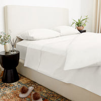 Blue and white Luxe Australian Sateen bedding bundle by Italic, twin-size bed with smooth, luxurious sateen sheets and pillowcases.
