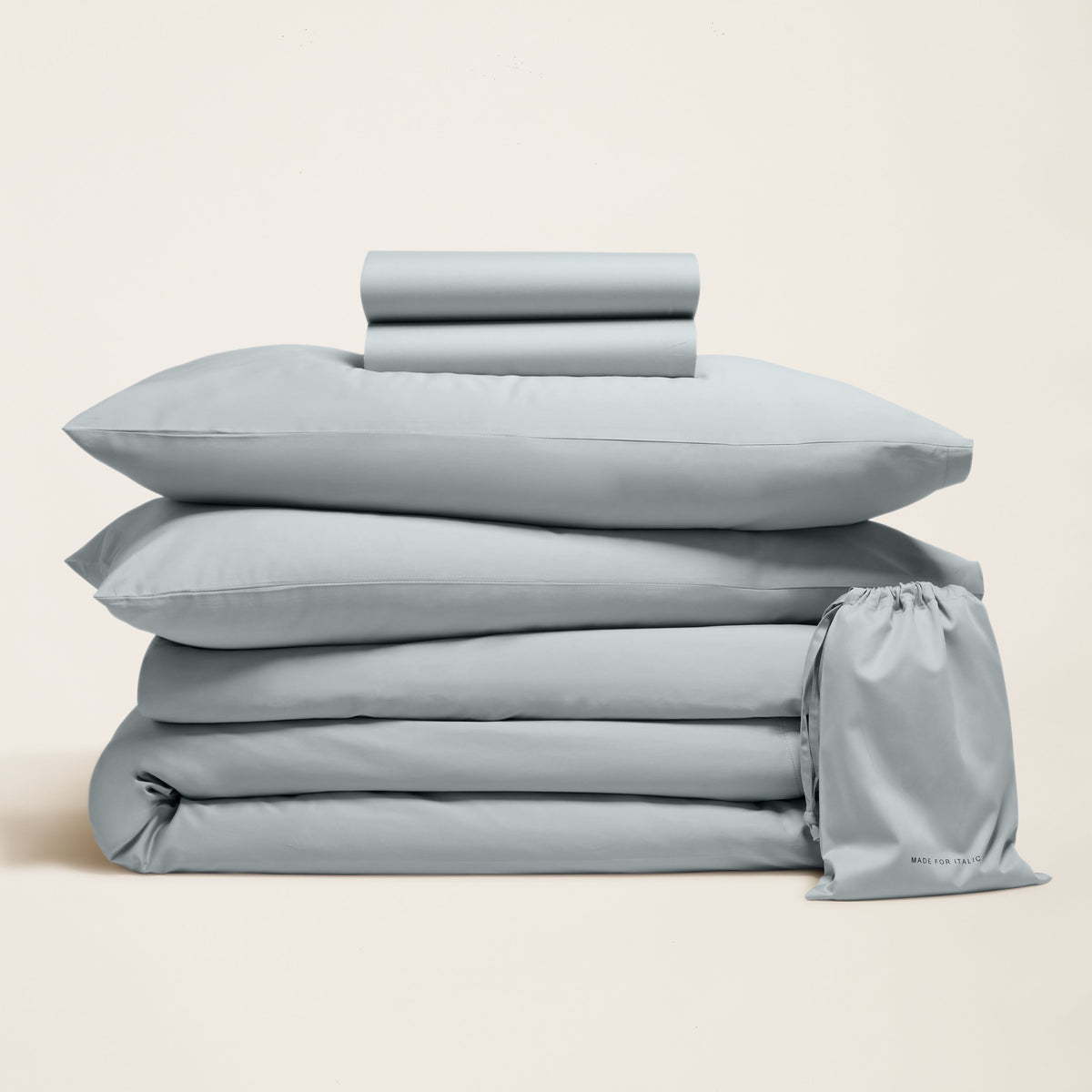 Blue and white Luxe Australian Sateen Bedding Bundle by Italic on a bed with soft, smooth sateen fabric in a cozy home bedroom setting.