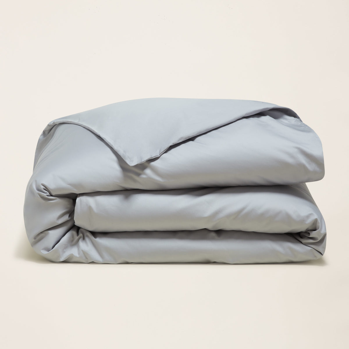 Blue and white Luxe Australian Sateen Bedding Bundle by Italic, featuring soft, luxurious twin bed sheets and pillowcases.