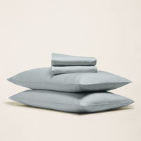 Blue and white Luxe Australian Sateen Bedding Bundle by Italic, twin-sized bed set with smooth, luxurious sateen fabric.