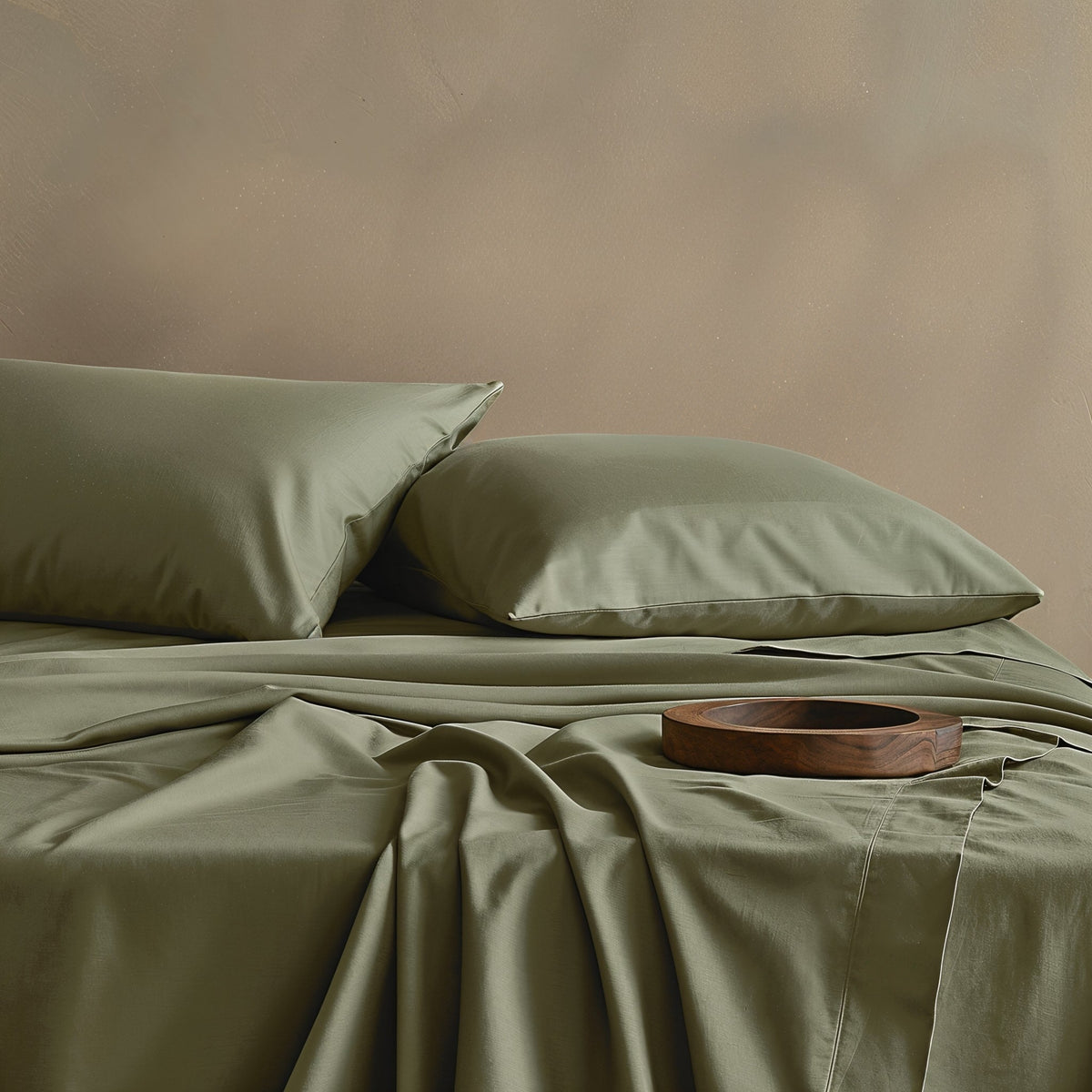 Blue and white Luxe Australian Sateen Bedding Bundle by Italic on a bed, showcasing smooth, luxurious satin bedding.