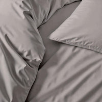Blue and white Luxe Australian Sateen Bedding Bundle by Italic, featuring soft, smooth twin bed sheets and pillowcases.