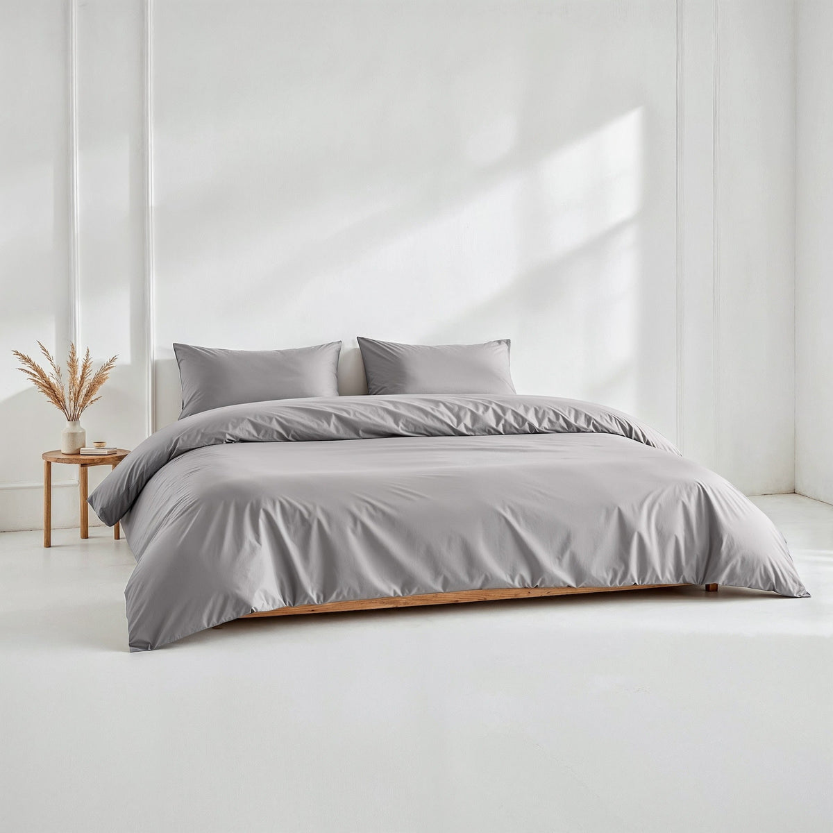 Blue and white Luxe Australian Sateen Bedding Bundle for twin beds from Italic, featuring smooth, luxurious satin fabric and elegant design.