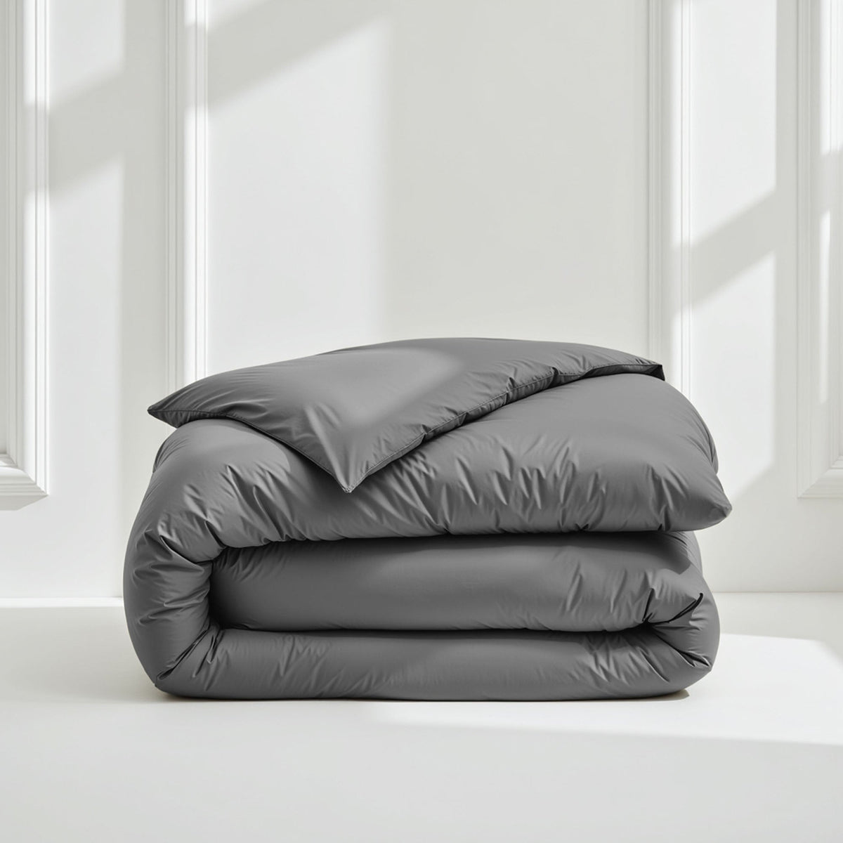 Blue and white Luxe Australian Sateen Bedding Bundle from Italic on a bed, featuring smooth, luxurious sateen sheets and pillowcases.