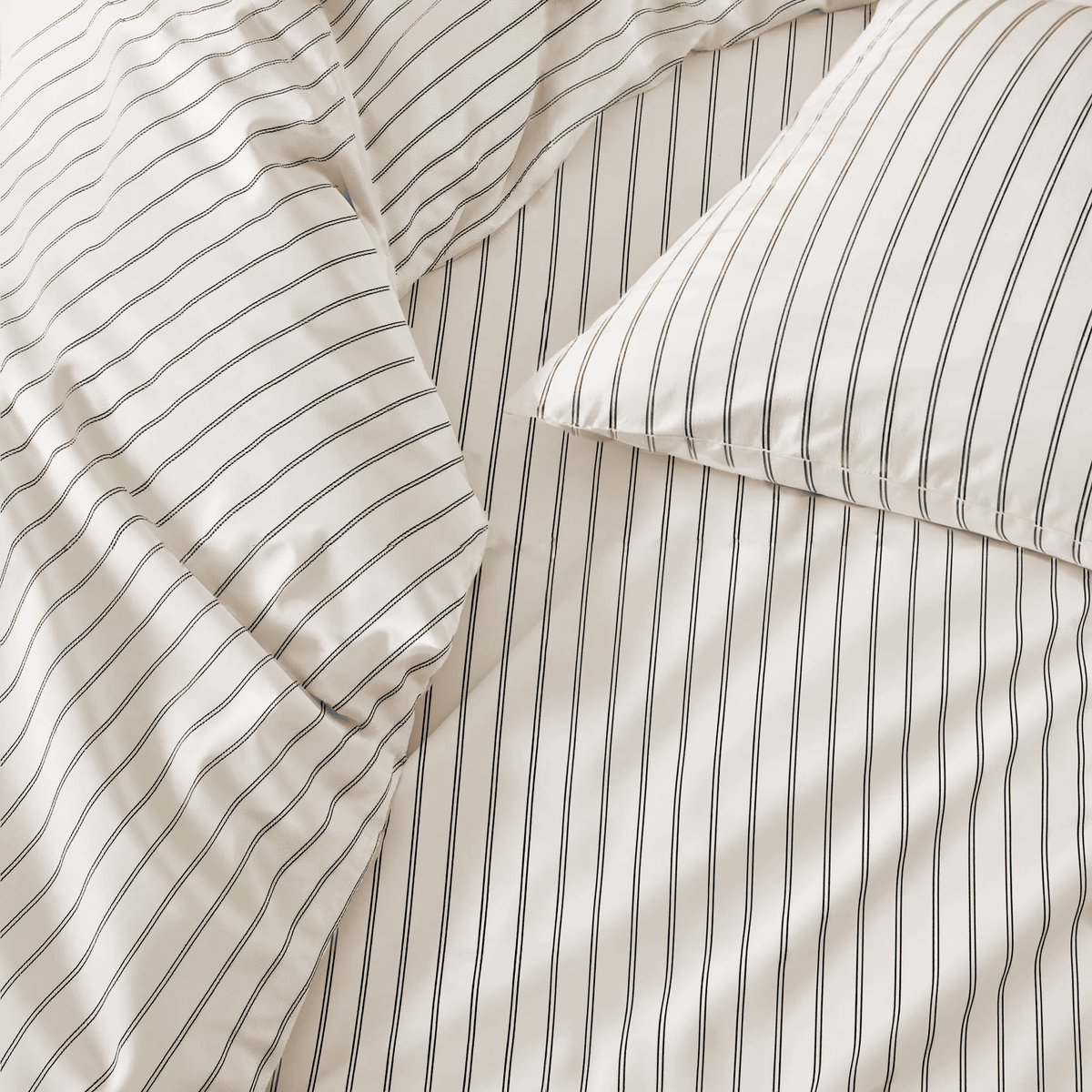 Blue and white Australian sateen bedding bundle by Italic, includes a twin bed sheet set with luxurious, smooth fabric.