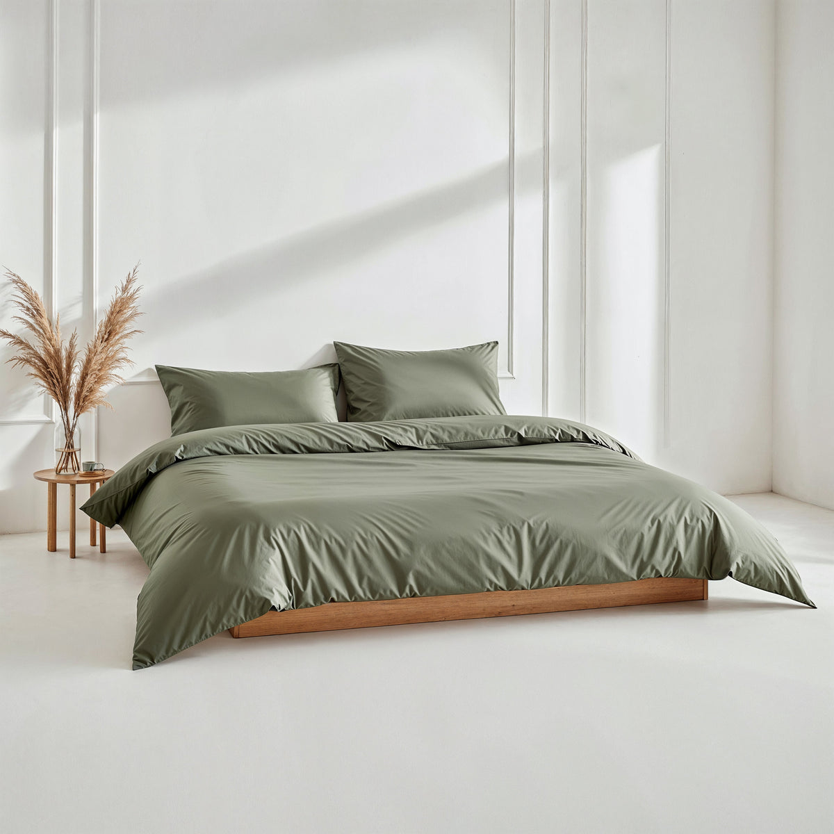 Blue and white Luxe Australian Sateen Bedding Bundle by Italic, featuring a cozy twin bed with smooth, luxurious fabric.